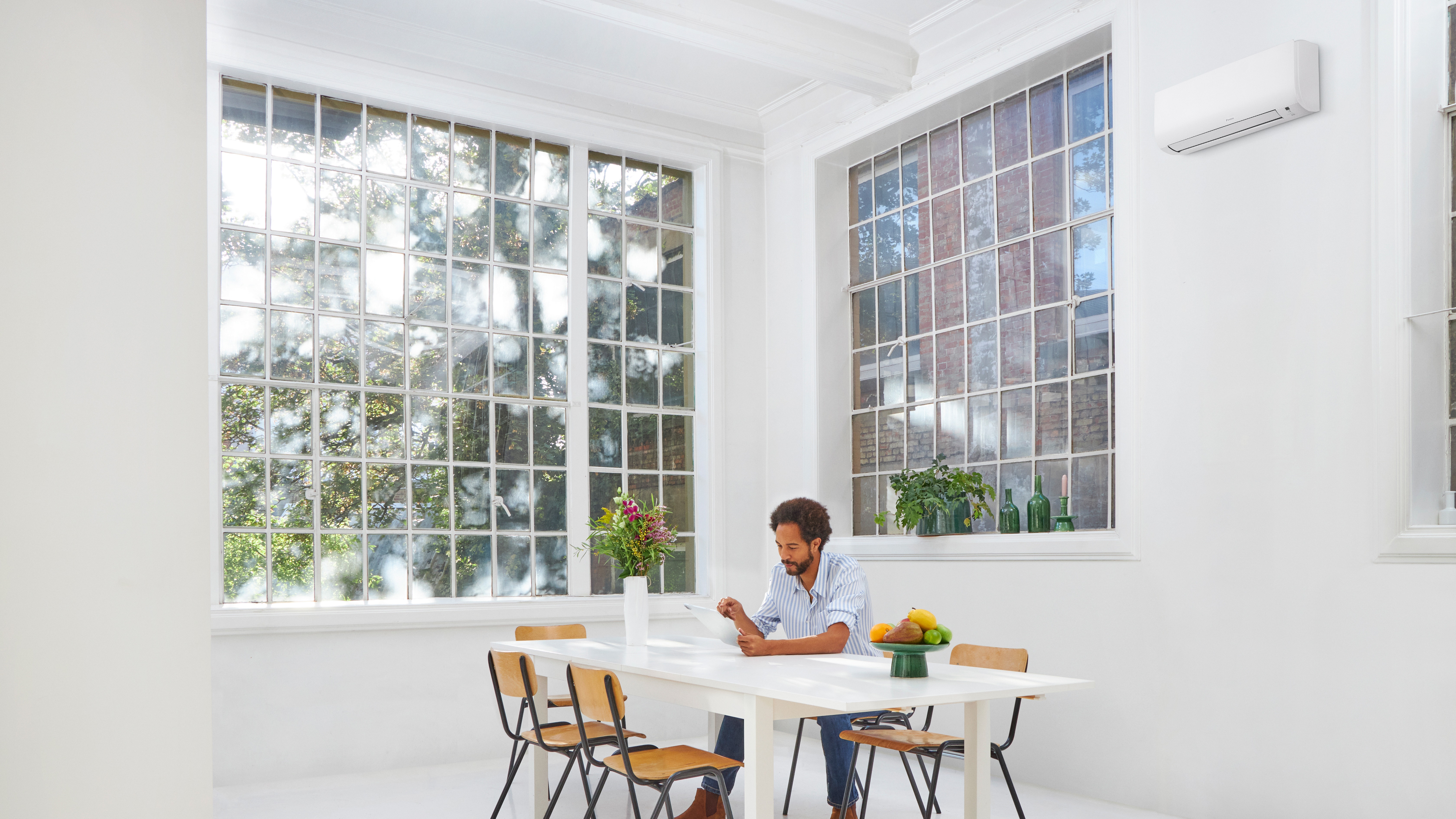 A man working in the living room