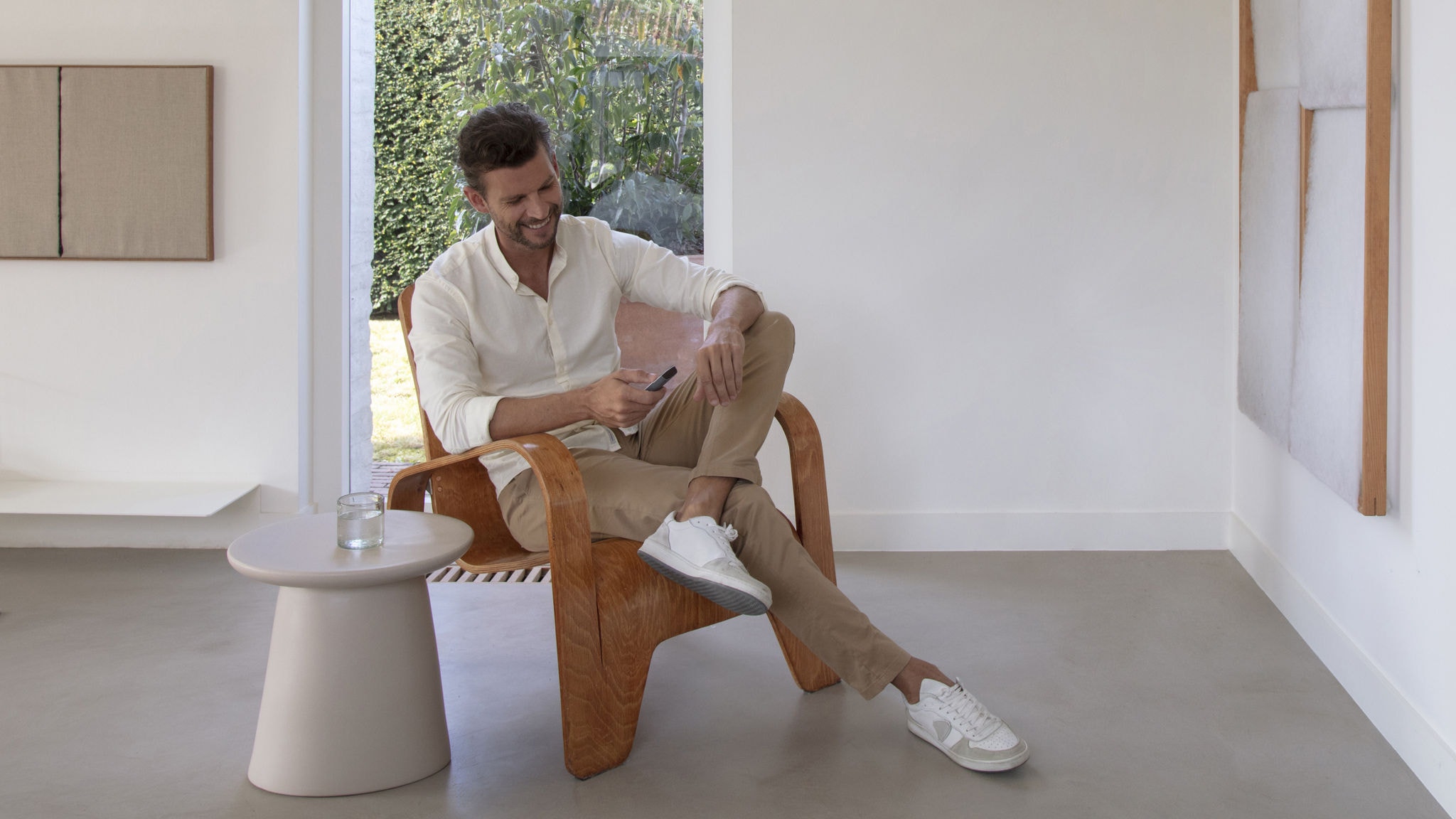 Man relaxing on a chair in perfect air conditioned temperature